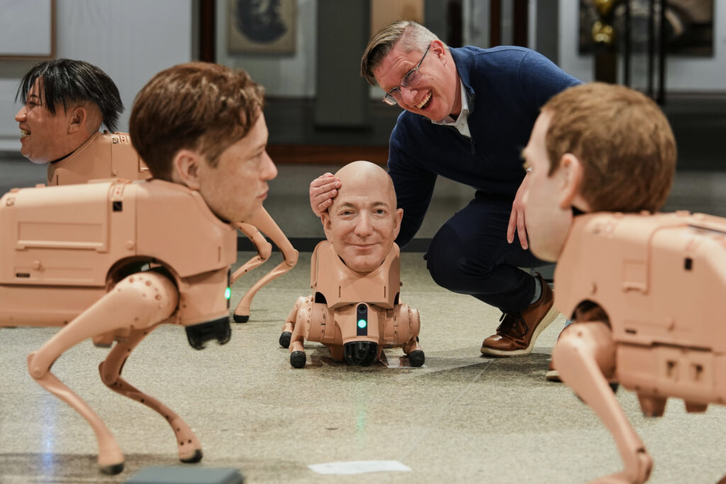 Beeple’s neue nationalgalerie installation: robot dogs with elon musk and mark zuckerberg heads take over berlin art scene