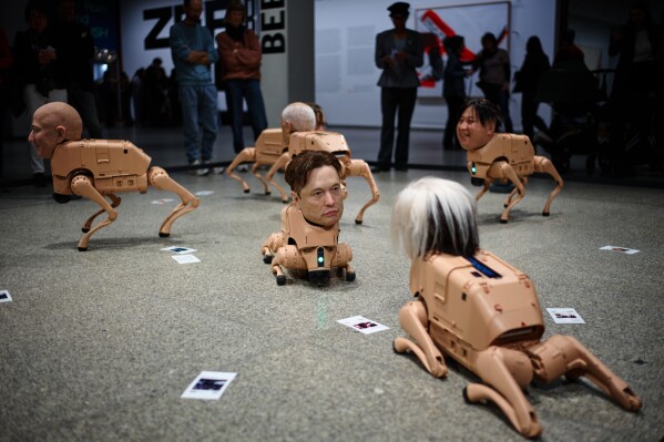 Beeple’s neue nationalgalerie installation: robot dogs with elon musk and mark zuckerberg heads take over berlin art scene